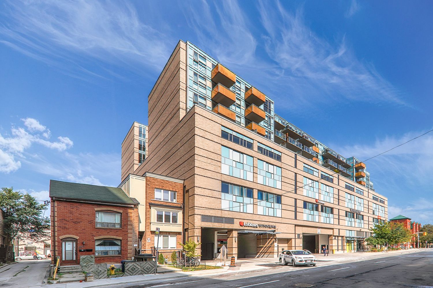 The Intersection of Queen Street West and Portland Street, in Th