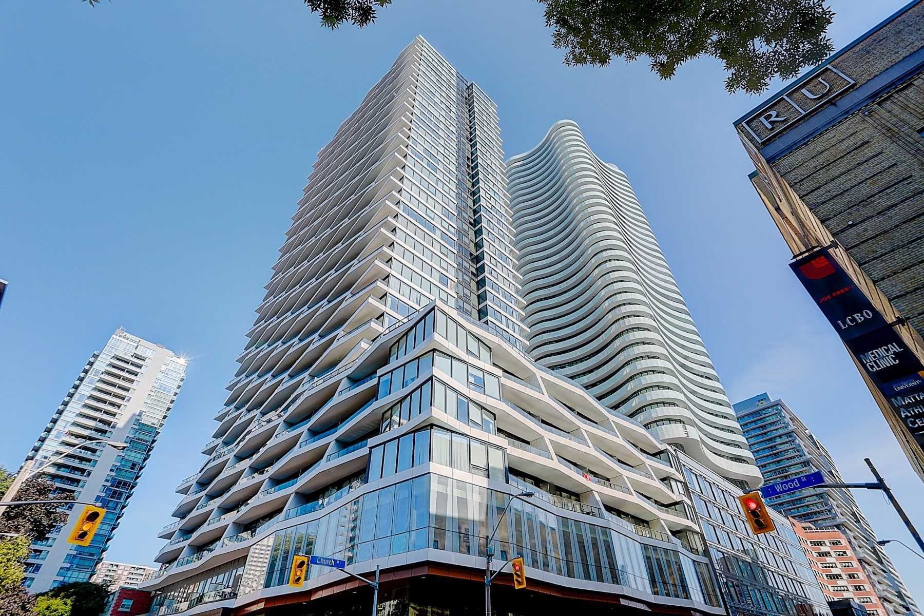 85 Wood St. This condo at Axis Condos is located in  Downtown, Toronto - image #2 of 2 by Strata.ca